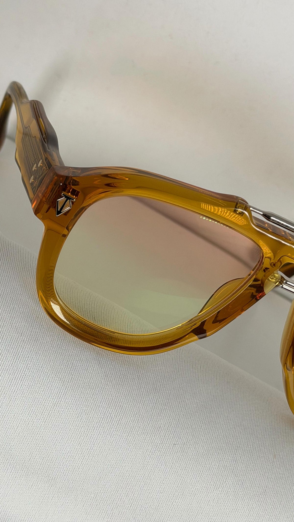 Honey acetate frame with a custom rose gradient lens tint by That Glasses Guy