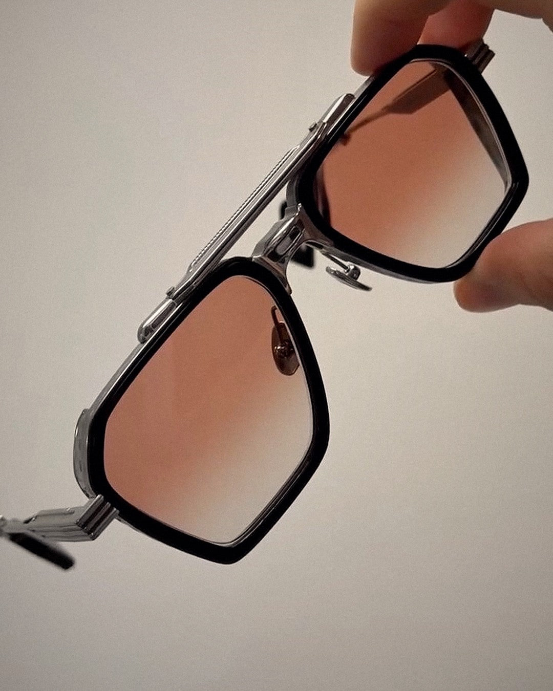 Metal and acetate sunglasses with a custom rose gradient tint by That Glasses Guy